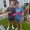 two guys holding bean bags for corn hole